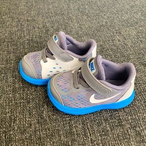 Blue and grey Nike shoes